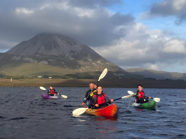 Kayaking on Dunlewey Lake with a group of young people