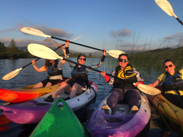 Kayaking on Dunlewey Lake with a group of young ladies with sunglasses