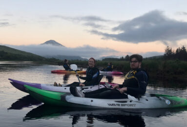 Early morning kayaking with a group of young men and women